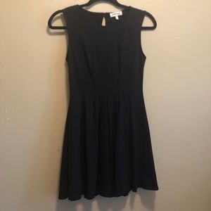 Black knit cocktail dress.